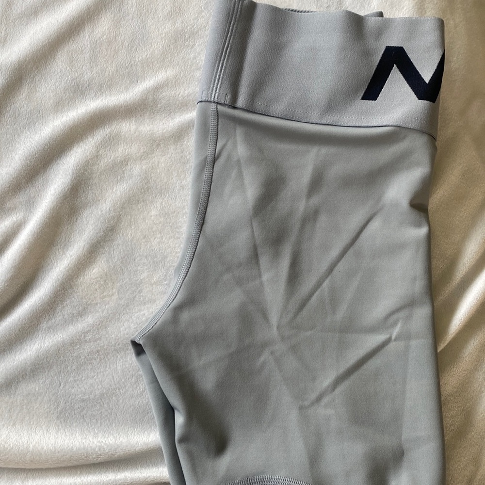 SOLD   NOT AVAILABLE.   NWOT  gray 7/8 nike leggings. Mesh on leg